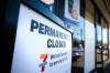 Ruth Bonneville / Free Press
                                Signs on the windows of 7/Eleven store at 665 McPhillips street at Selkirk Ave.