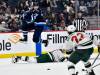 FRED GREENSLADE / THE CANADIAN PRESS FILES
                                Jets forward Morgan Barron leaps over Jon Merrill of the Minnesota Wild earlier this season. Part of the reason for the Jets&rsquo; success this season is the team&rsquo;s us-against-the-world mentality.
