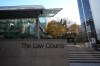 The Law Courts building, which is home to B.C. Supreme Court and the Court of Appeal, is seen in Vancouver, on Thursday, November 23, 2023. A review of information provided by provinces and territories show more than 400 criminal cases have been halted across Canada since the start of last year because they had exceeded time limits on how long criminal trials can take before violating an accused's Charter rights. THE CANADIAN PRESS/Darryl Dyck