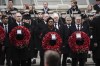 From left: Britain's former Prime Minister Rishi Sunak, Liberal Democrat leader Sir Ed Davey, former Prime Minister Liz Truss, leader of the opposition Kemi Badenoch, former Prime Minister Boris Johnson, Mayor of London Sadiq Khan and Prime Minister Sir Keir Starmer attend the National Service of Remembrance at The Cenotaph in London, England, Sunday, Nov. 10, 2024. (Aaron Chown/PA via AP)
