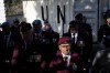 Canadian veterans stand commemorating the 60th anniversary of Canada's contribution to the UN Peacekeeping Force in Cyprus at Wolseley Barracks inside a UN-controlled buffer zone cleaving the capital Nicosia, Cyprus, on Monday, Nov. 11, 2024. (AP Photo/Petros Karadjias)