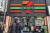 The Japanese owner of 7-Eleven says it has received a new management buyout proposal from a member of the family that helped found the company. People shop at a 7-Eleven convenience store in midtown Manhattan in New York on Tuesday, March 19, 2024. THE CANADIAN PRESS/AP/Ted Shaffrey
