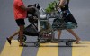 Shoppers push carts in Ottawa on Tuesday, June 25, 2024. The government on Thursday announced a sweeping promise to make goods like groceries, children's clothing, Christmas trees and restaurant meals free from GST/HST between Dec. 14 and Feb. 15. THE CANADIAN PRESS/Sean Kilpatrick