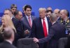 Prime Minister Justin Trudeau and U.S. President Donald Trump arrive to take part in a plenary session at the NATO Summit in Watford, Hertfordshire, England, Wednesday, Dec. 4, 2019. THE CANADIAN PRESS/Sean Kilpatrick
