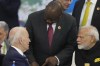 U.S. President Joe Biden, left, South Africa's President Cyril Ramaphosa, center, and India's Prime Minister Narendra Modi talk during the G20 Summit leaders meeting in Rio de Janeiro, Monday, Nov. 18, 2024. (AP Photo/Eraldo Peres)