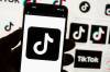Michael Dwyer / Associated Press Files
                                The TikTok logo is displayed on a mobile phone in front of a computer screen. The social media site is just one threat to children&rsquo;s safety.