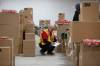 BROOK JONES / FREE PRESS FILES 
                                Terry Sharman volunteers as a Christmas hamper checker at the Christmas Cheer Board.
