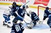 Fred Greenslade / THE CANADIAN PRESS
                                Tampa Bay&rsquo;s Conor Geekie (centre) interferes with Jets&rsquo; goaltender Connor Hellebuyck on Sunday leading to the Lightning&rsquo;s first goal.