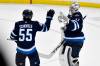Fred Greenslade / THE CANADIAN PRESS
                                Winnipeg Jets&rsquo; goaltender Connor Hellebuyck celebrates his shutout against the Utah Hockey Club with Mark Scheifele at the end of the third period.