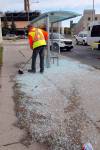 BORIS MINKEVICH / FREE PRESS FILES
                                City workers clean up broken glass from a bush shelter on Maryland near Notre Dame. The city is launching a new pilot project to see if polycarbonate panels would be a viable alternative for glass in Winnipeg Transit bus shelters.