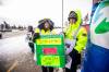 MIKAELA MACKENZIE / FREE PRESS
                                Kelsey Regehr (left) and Toni Montanti with the box for letters to Santa on the main depot picket line at 1870 Wellington Ave.