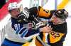 Pittsburgh Penguins' Sidney Crosby (87) fights with Winnipeg Jets' Kyle Connor (81) during the third period of an NHL hockey game Friday, Nov. 22, 2024, in Pittsburgh. The Jets won 4-1. (AP Photo/Gene J. Puskar)