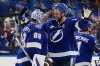 Tampa Bay Lightning defenseman Victor Hedman (77) hugs goaltender Andrei Vasilevskiy (88) after Vasilevskiy picked up his 300th career win during an NHL hockey game against the Winnipeg Jets Thursday, Nov. 14, 2024, in Tampa, Fla. (AP Photo/Chris O'Meara)