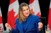Deputy Prime Minister and Finance Minister Chrystia Freeland speaks with reporters in Ottawa, Tuesday, Dec. 10, 2024. THE CANADIAN PRESS/Adrian Wyld