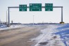 Road signage is posted just outside of Emerson, Man., Jan. 20, 2022. THE CANADIAN PRESS/John Woods