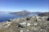 FILE - Small pieces of ice float in the water in Nuuk Fjord, Greenland, on June 15, 2019. (AP Photo/Keith Virgo, File)