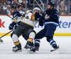 John Woods / THE CANADIAN PRESS
                                Winnipeg Jets&rsquo; Mason Appleton (22) defends against Vegas Golden Knights&rsquo; Victor Olofsson (95) during second period NHL action in Winnipeg, Thursday, Dec. 12, 2024.