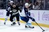 Ryan Sun / The Associated Press files
                                Jets defenceman Colin Miller (right) hasn&rsquo;t missed a beat since returning to the lineup.