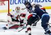 JOHN WOODS / THE CANADIAN PRESS
                                Ottawa Senators goaltender Mads Sogaard (40) saves the shot from Winnipeg Jets&rsquo; Nikolaj Ehlers (27) during third period NHL action in Winnipeg on Saturday.