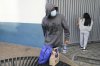 Guatemalan migrants wait to be picked up by relatives after being deported from the United States, at La Aurora airport in Guatemala City, Monday, Jan. 27, 2025. (AP Photo/Moises Castillo)