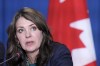 Alberta Premier Danielle Smith speaks to the media during the fall meetings of Canada's premiers hosted by Ontario in Toronto, Monday, Dec. 16, 2024. Smith says she received 