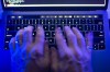 A man uses a computer keyboard in Toronto on Monday, Oct. 9, 2023 in this photo illustration. THE CANADIAN PRESS/Graeme Roy