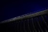 Concertina wire tops a section of a border wall separating Mexico from the United States Tuesday, Jan. 21, 2025, in San Diego. (AP Photo/Gregory Bull)