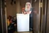 RUTH BONNEVILLE / FREE PRESS
                                Local - Fears living in MB. Housing Photo of Moira Connolly next to her freezer that she has to push in front of her door each night to keep herself safe in her 55 Plus Manitoba Housing Complex. HOMELESSNESS STRATEGY: Manitoba Housing residents Moira Connolly, a senior in St. James, and an Ojibwa elder on Kennedy downtown scared to publish her name both contacted the Free Press to say theyղe worried after hearing Wab Kinewճ strategy to end chronic homelessness. The older women say the increasingly chaotic and unsafe conditions in their buildings (hallway defecation, fighting, robberies, fires, assaults, open drug trafficking, screaming obscenities and other disrespectful and unruly behaviour) will only get worse as more homeless, addicted and mentally ill people are moved into Manitoba Housing under the homelessness strategy. See story by CAROL Jan 17th, 2025