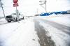 MIKAELA MACKENZIE / FREE PRESS 	 A four way stop turned ice-skating rink at St. Matthews Avenue and Berry Street on Thursday, Jan. 23, 2025. Although many main roads have been sanded, smaller ones donմ have any (and even on the larger roads, the city says that high winds are blowing the sand off). For Malak story. Winnipeg Free Press 2025