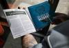 Greg, recently released from prison and staying at John Howard Society’s halfway house, sees his story A Brush With Time printed in The Inside Scoop. He turned to reading while behind bars to help stay away from drugs, and is excited for his children to see the piece he created. (Ruth Bonneville / Free Press)