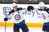 Charles Krupa / The Associated Press
                                Winnipeg Jets&rsquo; Mark Scheifele, left, is congratulated by Gabriel Vilardi after his second goal against the Bruins in the third period Thursday in Boston.
