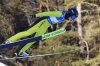 FILE - United States' Annika Belshaw competes at the Women's Normal Hill Individual Ski Jumping World Cup event in Villach, Austria, Jan. 3, 2024. (AP Photo/Darko Bandic, File)
