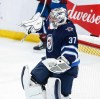Winnipeg Jets goaltender Connor Hellebuyck (37) celebrates his shutout win against the Colorado Avalanche in NHL action in Winnipeg on Saturday, January 11, 2025. THE CANADIAN PRESS/John Woods