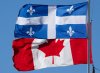 The flags of Canada and Quebec fly in Gatineau, Que., Monday, Nov. 1, 2021. THE CANADIAN PRESS/Adrian Wyld