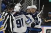 Winnipeg Jets left wing Nikolaj Ehlers, centre, is congratulated by teammates after scoring a goal against the St. Louis Blues during the first period of an NHL hockey game, Saturday, Feb. 22, 2025, in St. Louis. (AP Photo/Jeff Le)