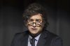 Argentina's President Javier Milei speaks after receiving this year's Roepke Prize for Civil Society of the Liberal Institute at the Congress centre in Kloten, Switzerland, Friday, Jan. 24, 2025. (Ennio Leanza/Keystone via AP)