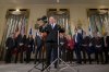 Ontario Premier Doug Ford, accompanied by other Council of the Federation members, speaks to reporters at the Mayflower Hotel in Washington on Wednesday, Feb. 12, 2025. THE CANADIAN PRESS/AP/Ben Curtis