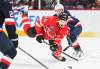 Canada&rsquo;s Josh Morrissey (44) is tripped by United States&rsquo; Jake Guentzel (59) during first period 4 Nations Face-Off hockey action in Montreal on February 15, 2025. THE CANADIAN PRESS/Graham Hughes