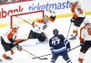 Philadelphia Flyers goaltender Ivan Fedotov (82) saves the shot from Winnipeg Jets' Nikolaj Ehlers (27) during third period NHL action in Winnipeg on Saturday, March 1, 2025. THE CANADIAN PRESS/John Woods