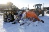 City of Winnipeg workers remove a homeless camp in downtown Winnipeg, Thursday, Jan. 16, 2020.  THE CANADIAN PRESS/John Woods
