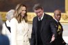 Former NHL player Wayne Gretzky, right, and his wife Janet Jones arrive before the 60th Presidential Inauguration in the Rotunda of the U.S. Capitol in Washington, Monday, Jan. 20, 2025. THE CANADIAN PRESS/Kevin Lamarque/Pool Photo via AP