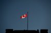 A Canadian flag flies over the Prime Minister's Office near Parliament Hill in Ottawa, on Wednesday, Jan. 15, 2025. THE CANADIAN PRESS/Spencer Colby