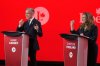 Liberal Party of Canada leadership candidates Mark Carney and Chrystia Freeland share a laugh during the French-language Liberal Leadership debate in Montreal, Monday, Feb. 24, 2025. The federal Liberals will pick a new leader on March 9. THE CANADIAN PRESS/Christinne Muschi