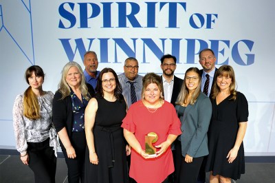 Employees at NFI Group receive an award at the annual Spirit of Winnipeg Awards Gala.