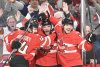 Canada's Connor McDavid (97) celebrates with teammates Josh Morrissey (44) and Sam Reinhart (13) after scoring against the United States during first period 4 Nations Face-Off hockey action in Montreal on February 15, 2025. THE CANADIAN PRESS/Graham Hughes
