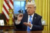 President Donald Trump speaks with reporters in the Oval Office at the White House, Tuesday, Feb. 11, 2025, in Washington. THE CANADIAN PRESS/AP-Alex Brandon