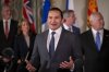 Premier of Manitoba Wab Kinew, accompanied by other Council of the Federation members, speaks to reporters at the Mayflower Hotel in Washington, Wednesday, Feb. 12, 2025. THE CANADIAN PRESS/AP-Ben Curtis
