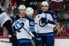 Winnipeg Jets' Adam Lowry (17) celebrates with teammates Nino Niederreiter (62) and Mason Appleton (22) after scoring a goal during the third period of an NHL hockey game against the New Jersey Devils Friday, March 7, 2025, in Newark, N.J. (AP Photo/Frank Franklin II)