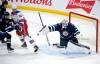 Fred Greenslade / THE CANADIAN PRESS
                                Jets goaltender Connor Hellebuyck makes one of his 21 saves Tuesday night against the New York Rangers.
