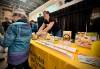 SCOTT BILLECK / FREE PRESS
                                Sandra Dyck, an egg farmer from Springstein, hands out recipes and egg-related trinkets to visitors at her booth at Agriculture in the City at Outlet Collection Winnipeg on Saturday.